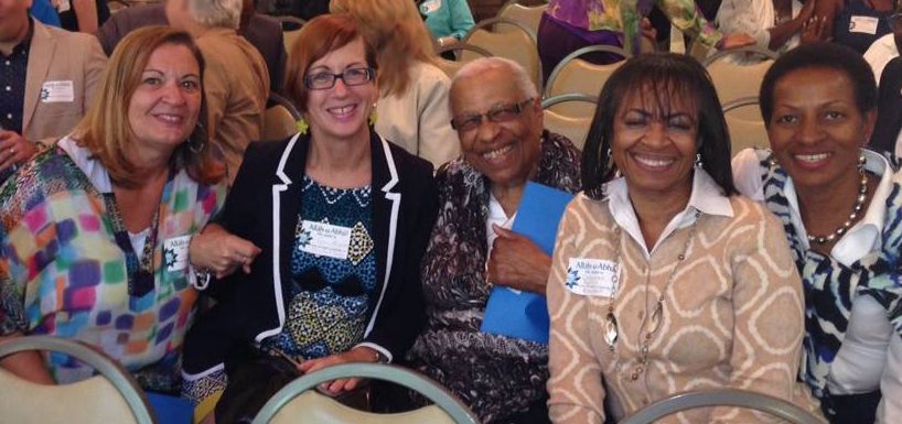 Five friends smile at the camera at a Unit Convention in Columbia SC