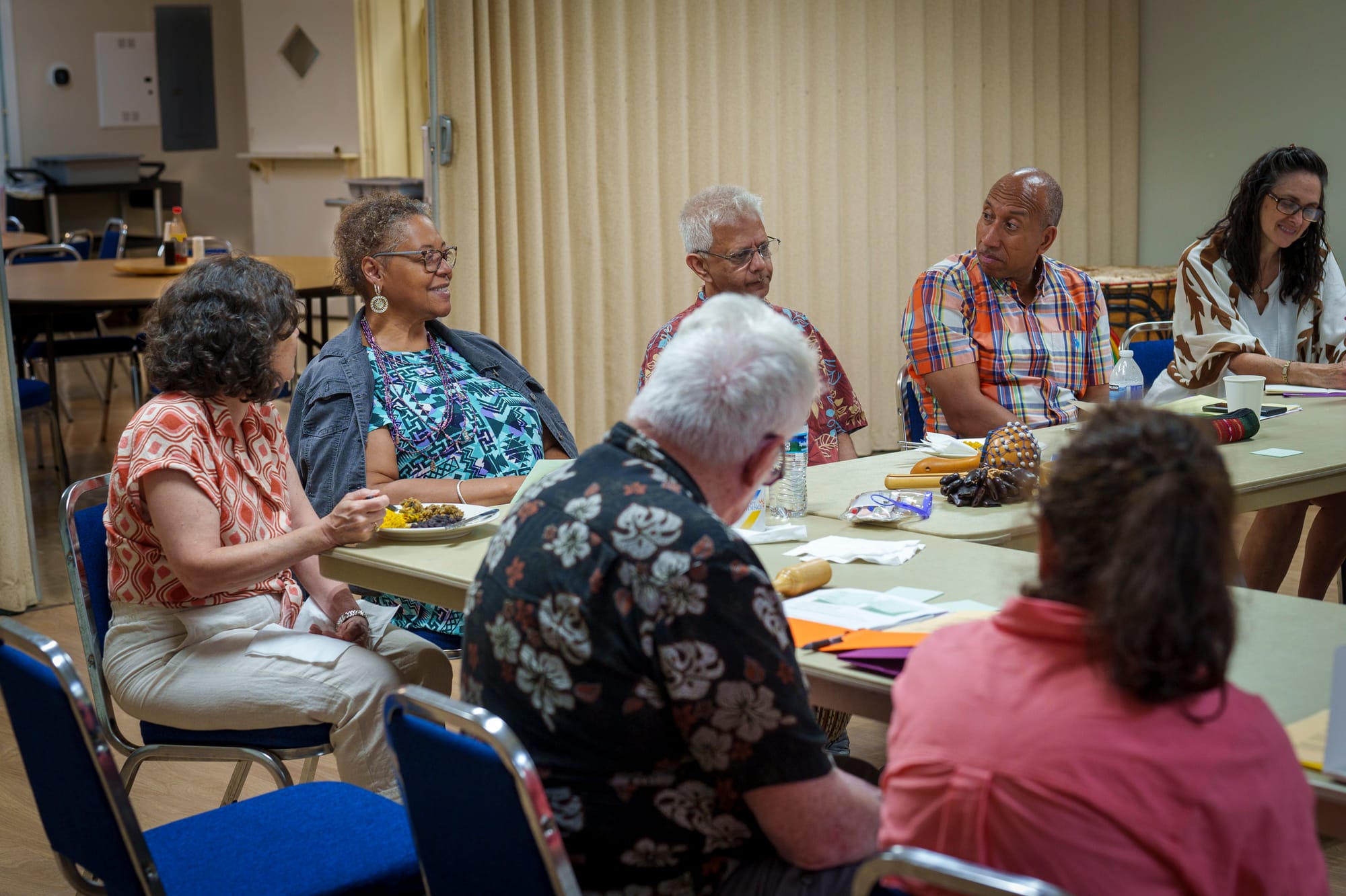 ATC Training participants listen to a report from one of the teams about their home visit experience.